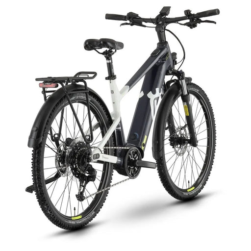A full-suspension electric bicycle with a matte black frame, white accents, black tires, and a rear cargo rack, shown on a clean white background.