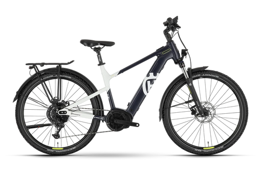 A step-through electric bicycle with a dark navy blue frame, white accents, black tires, and a rear cargo rack, shown from a side profile on a white background.